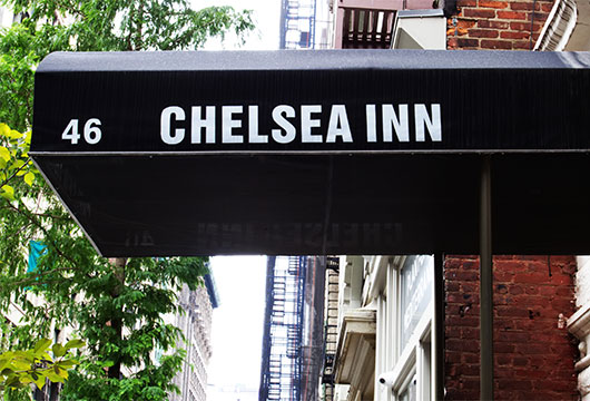 Purple awning of entrance to Chelsea Inn